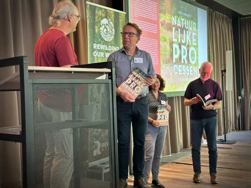 Leo Linnartz book presentation at Rewilding our World Conference, with Frans Vera and Patrick Jansen
